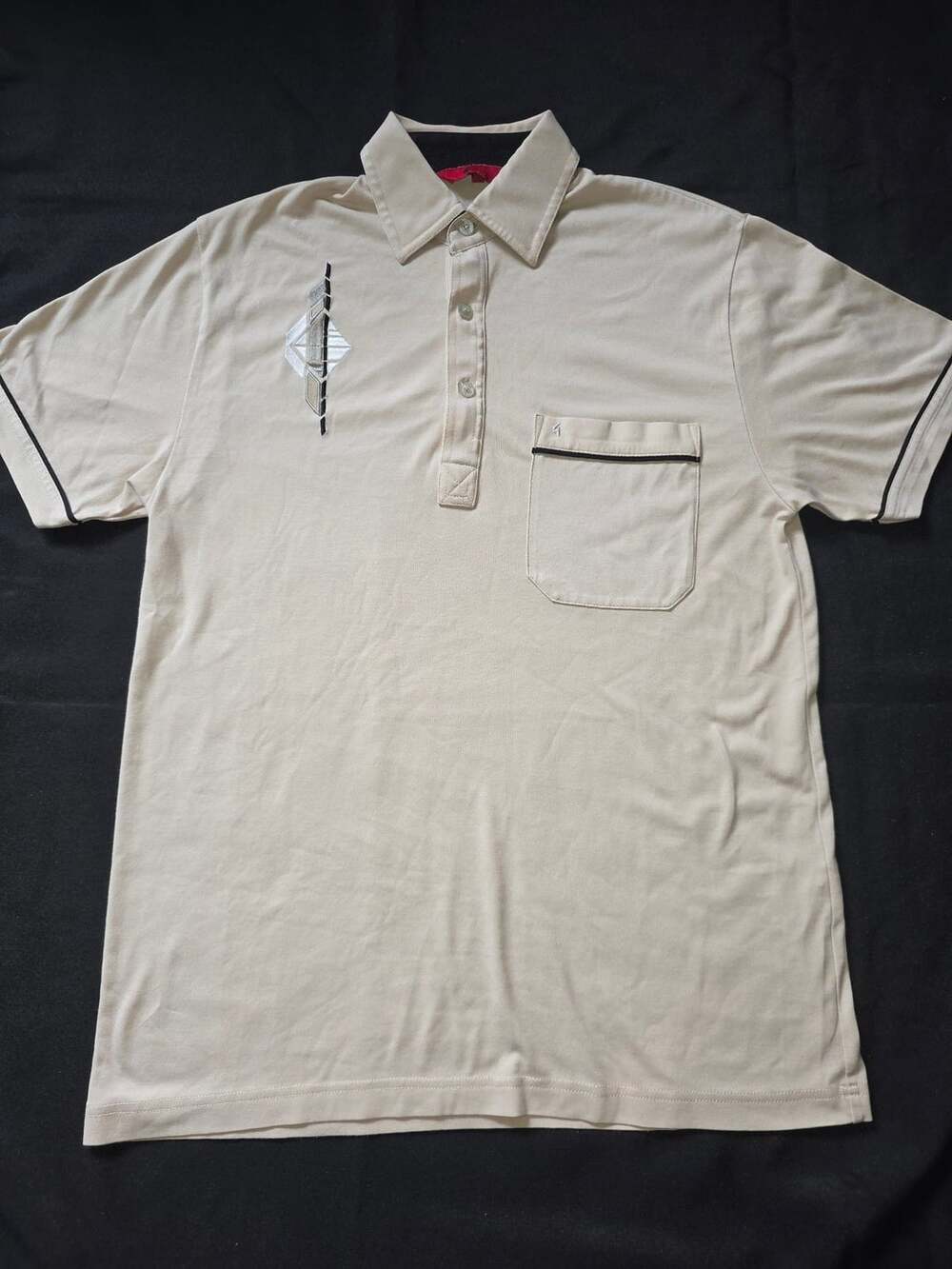 Gabicci Beige Polo Shirt with Geometric Embroidered Chest Design and Pocket Size